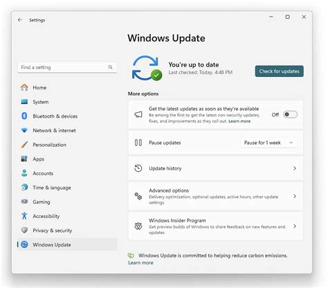 A person clicking through the Windows update settings on a computer.