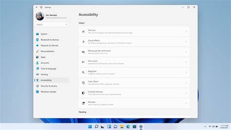 A person adjusting accessibility settings on a Windows 11 laptop.