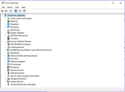 Hands navigating the device manager on a Windows computer.