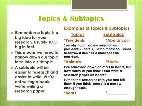 A student outlining subtopics on a notepad for an essay about World War II.