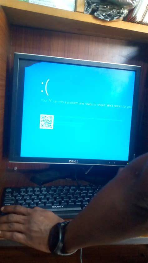 A computer screen showing a blue screen error with diagnostic information.