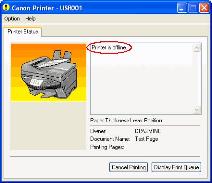 A printer with an 'offline' error message displayed on the screen.