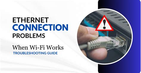 A person sitting at a desk troubleshooting their Ethernet connection.