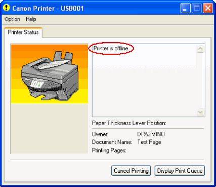 A printer with an 'offline' error message displayed on the screen.