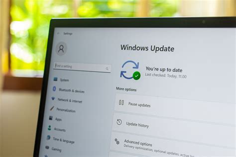 A user checking for updates on their Windows 11 laptop.