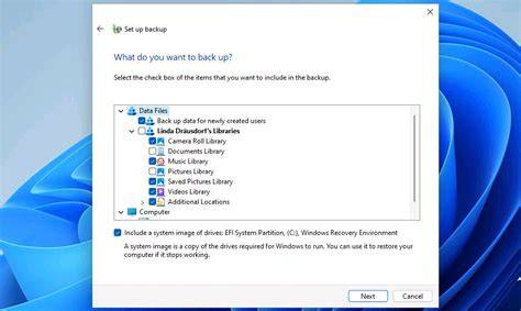 A user backing up files on a Windows 11 computer using an external drive.